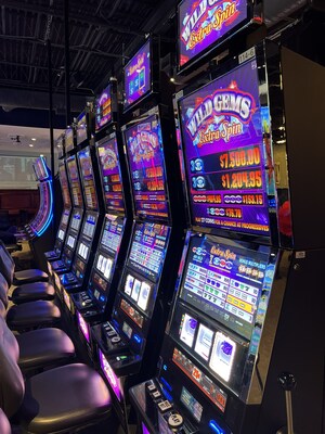 Row of Everi Wild Gems Extra Spin cabinets on a casino floor